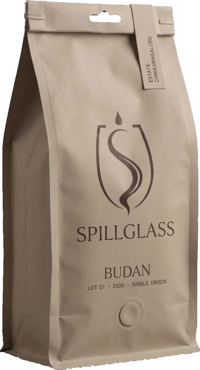 The SPILLGLASS Budan pack, kraft paper with a gold chalice mark.