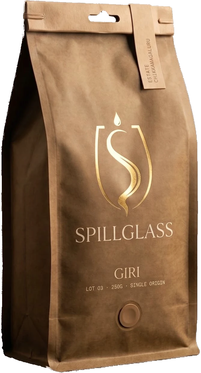 The SPILLGLASS Giri pack, kraft brown with a gold chalice mark.